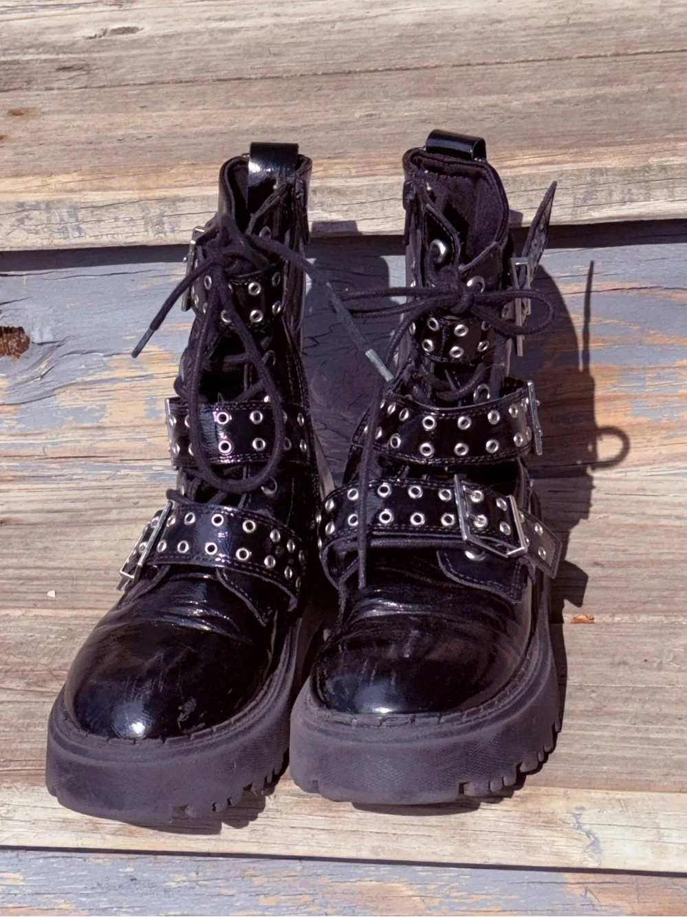 Zara black patent leather buckle combat moto boots, featuring a glossy finish 34